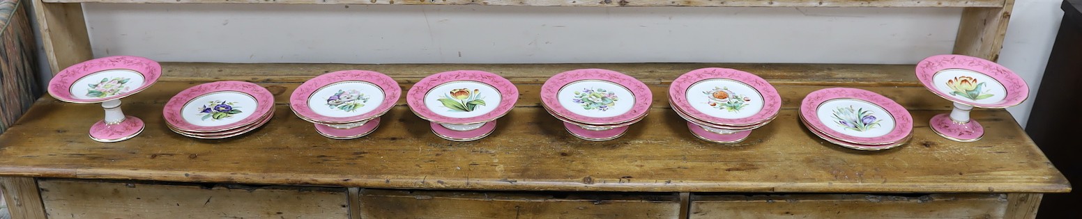 An English porcelain pink ground floral dessert service, late 19th century